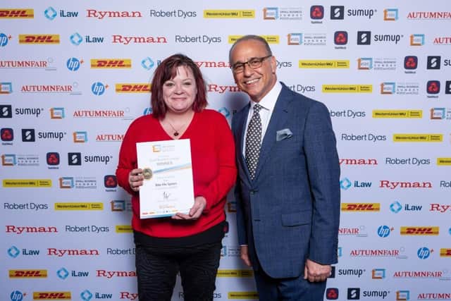 Founder of Bite Me Spices, Sera Harman, with Dragons' Den star, Theo Paphitis.