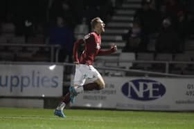 Mitch Pinnock celebrates firing the Cobblers into an early lead against Walsall (Pictures: Pete Norton)