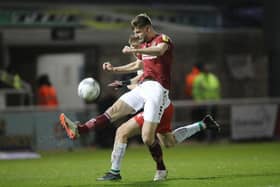 Jon Guthrie clears the ball during the Cobblers' 1-1 draw with Walsall on Tuesday (Picture Pete Norton)
