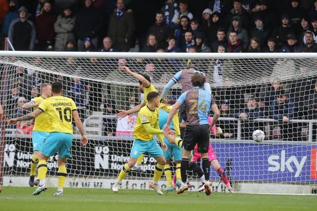 Fraser Horsfall heads in his first goal.