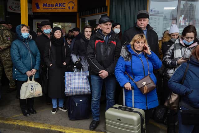 Over a million people have already fled Ukriane, many with just what they can carry in a suitcase. Photo: Getty Images.