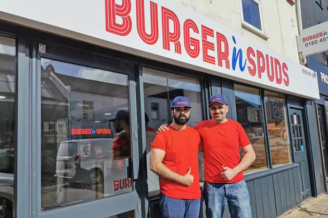 Amir (left) and Burger 'n' Spuds' chef outside the restaurant