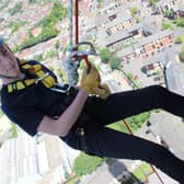 Thomas Cole, 15, when he abseiled in 2019 raising £565 for the Palliative Care team at Northampton General Hospital.