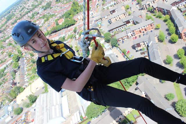 Thomas Cole, 15, when he abseiled in 2019 raising £565 for the Palliative Care team at Northampton General Hospital.