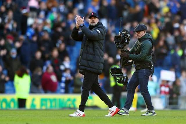 Liverpool boss Jurgen Klopp guided his team to a 2-0 victory at Brighton yesterday which leaves them just three points behind Premier League leaders Manchester City