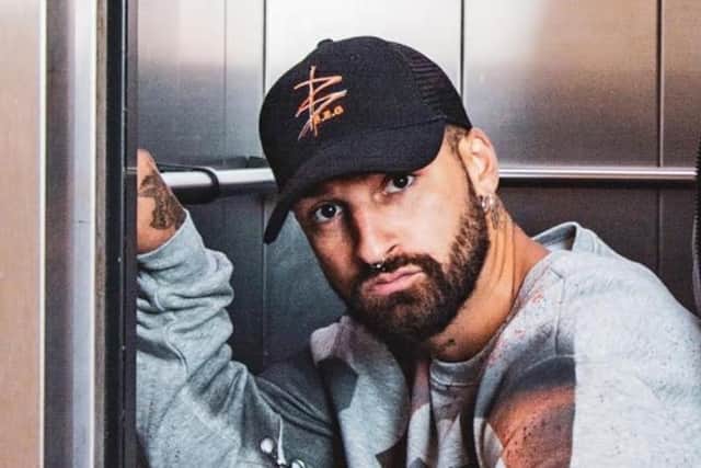 Fashion designer, Brinton Edwards, 29.