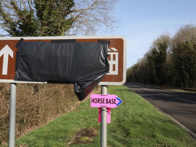 Tourist signs have been covered up