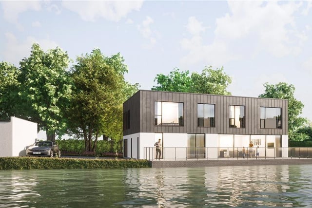 How artists expect the under construction, lakeside house to look upon completion. Photo: Carter Jonas.