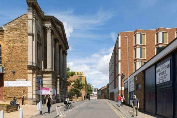 An artist's impression of what College Street would look like with both the Debenhams flats (right) and the College Street flats (left) built