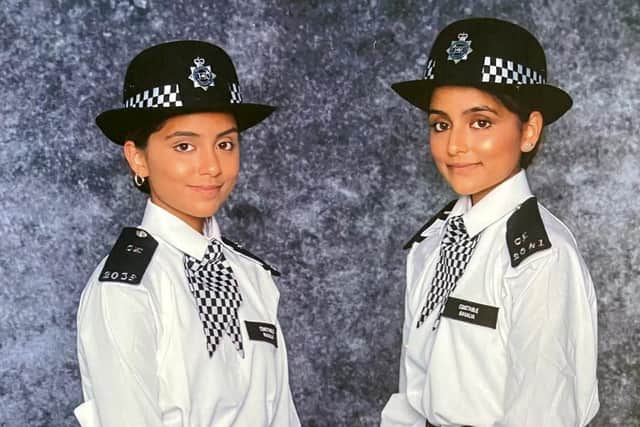 Northamptonshire twins Leigha and Ria Ravalia are on the beat in East London. Photo: SWNS