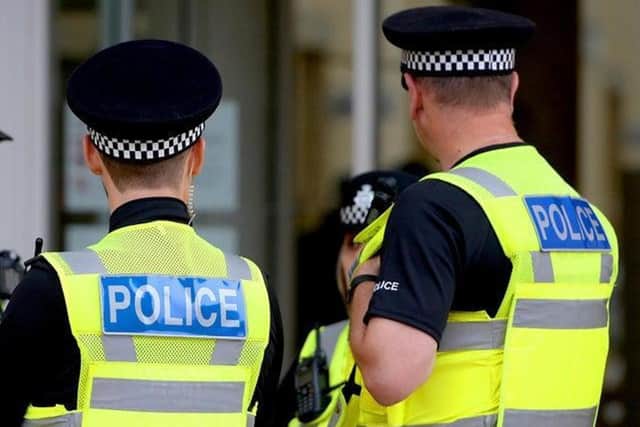 Police have charged a 48-year-old woman after discovereing a body in a Northampton garden on Saturday