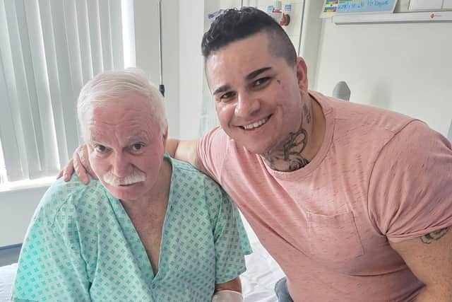 Recovering - Carlos Marques in hospital being visited by son Mauro