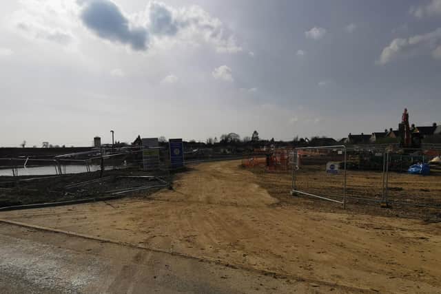 A sign on the site says the homes are 'coming soon' but a completion date has not yet been announced