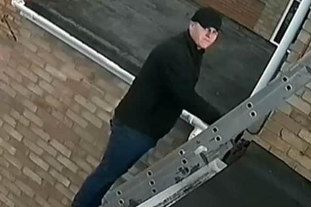 The man on the ladder may have information to help police after an incident of rogue trading