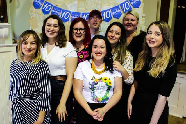 Pictured: Louise Verity (centre) with her team