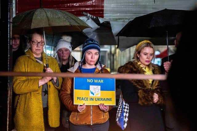 A vigil was held in Northampton town centre on February 28 to show support for Ukraine. Photo by Kirsty Edmonds.