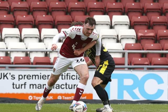 Ryan Edmondson holds the ball up for the Cobblers in their 1-1 draw with Bristol Rovers (Pictures: Pete Norton)
