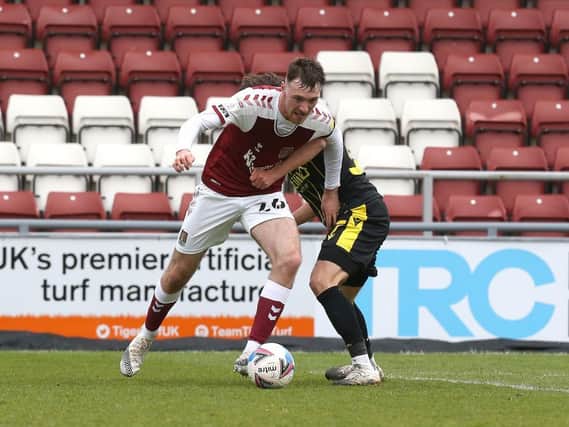 Ryan Edmondson holds the ball up for the Cobblers in their 1-1 draw with Bristol Rovers (Pictures: Pete Norton)