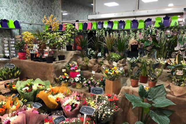 Janice Strachan was able to reopen her florist too.