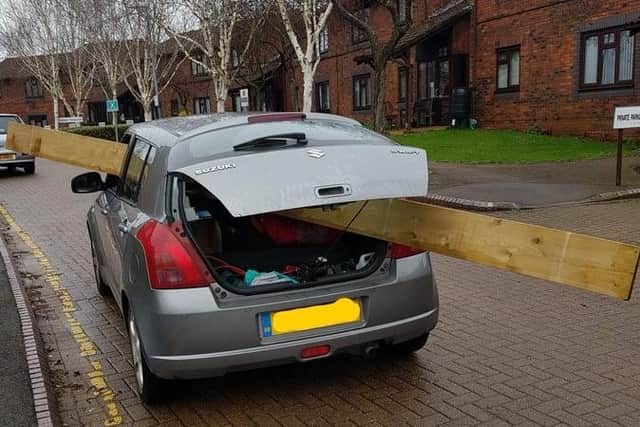 Police spotted the vehicle heading through Kettering with wood sticking out. Photo: @KetteringPolice