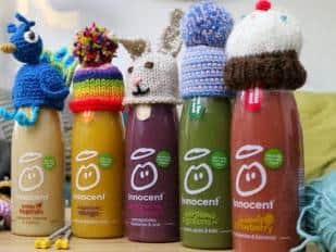 Raise money for Age UK by knitting little hats for Innocent smoothie bottles!