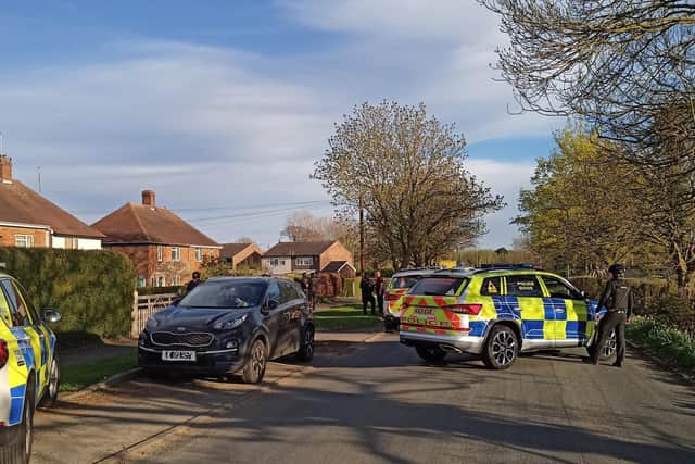 Armed police outside the house in Harpole