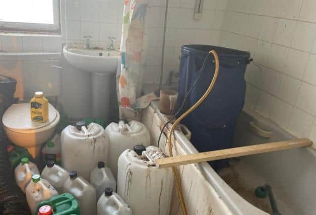 This was the state of the bathroom in a property raided on Tuesday