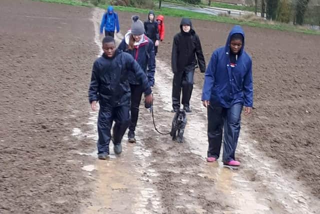 The community fund helped to buy waterproof coats for a walking group.