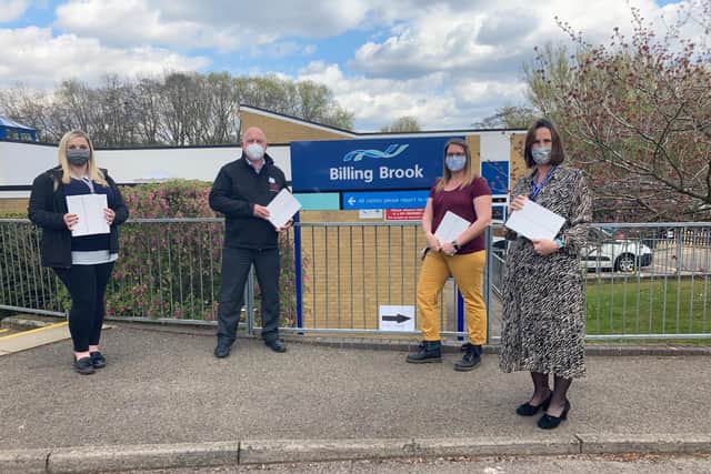 Weston Favell Shopping Centre marketing manager Zoe Butler (left) and centre manager Kevin Legg donate iPads to Billing Brook School head teacher Karen Lewis and English lead Laura Browett