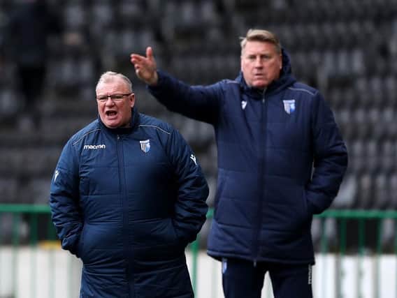 Steve Evans and his assistant Paul Raynor.