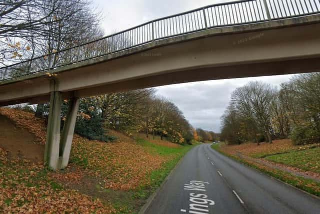 Police arrested a 13-year-old boy after he was seen dropping a fence post off this footbridge in Lings Way on Sunday