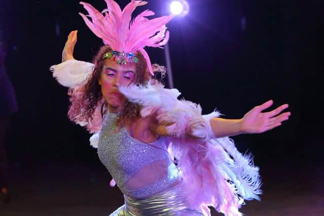 Reigning Northampton Carnival Queen, Sharlun Watkins, performing at the regional costume competition.