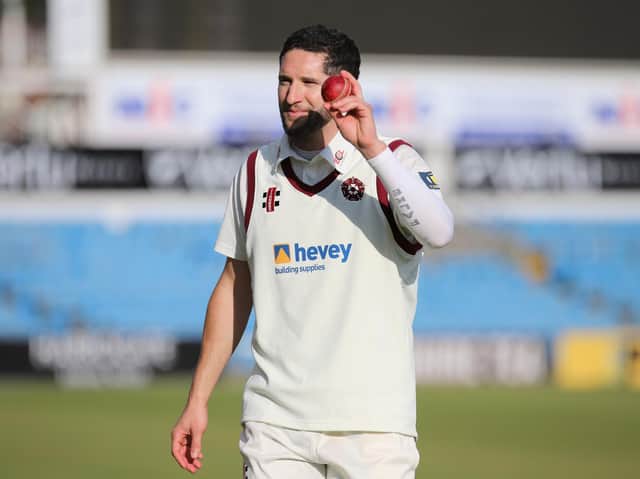 Wayne Parnell raises the match ball in celebration of his five-wicket haul for Northants (Pictures: Pete Short)