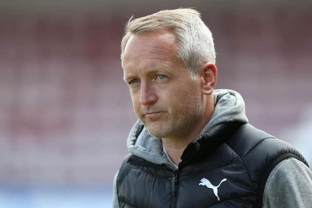Neil Critchley.