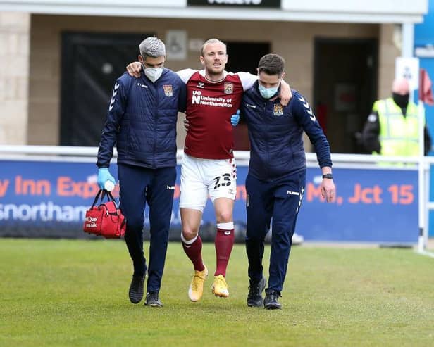 Joseph Mills couldn't put any weight on his ankle after suffering a painful injury in the early stages of Saturday's defeat to Blackpool. Picture: Pete Norton.