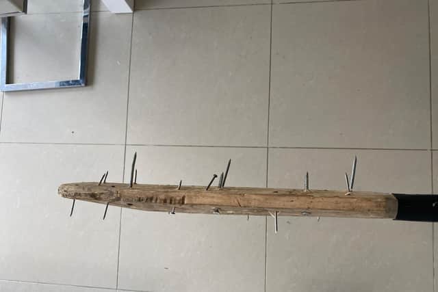 The cricket bat fitted with nails used to cause some of the destruction