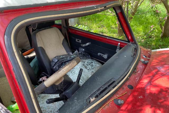The damaged Mini Cooper
