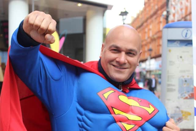 Saleem Syed dresses up as Superman to promote The British Mobility Project