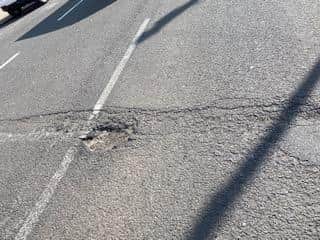 The driver's mum is now keen to get answers from the council about the potholes.