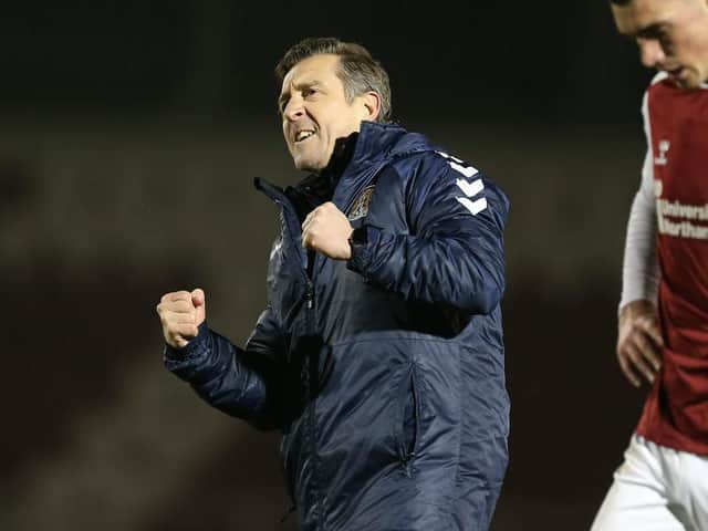 Jon Brady celebrates his first win as caretaker manager against Plymouth.