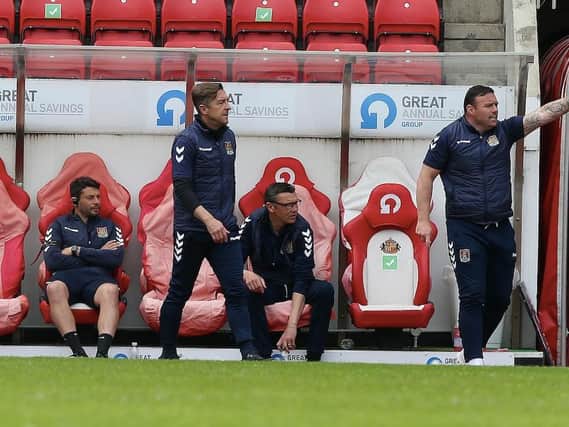 Jon Brady and his coaching staff during Sunday's game at Sunderland. Picture: Pete Norton.