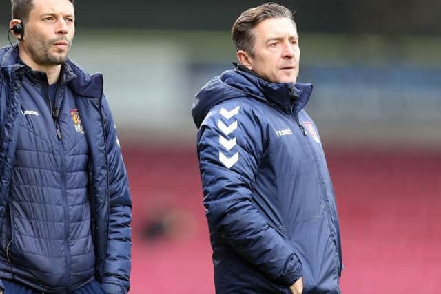Marc Richards will work alongside Brady as first-team coach.