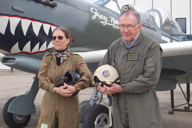 Chris with pilot Anna Walker and the Spitfire, decked in the Pacific War camouflage of 457 Squadron, Royal Australian Air Force complete with shark's teeth