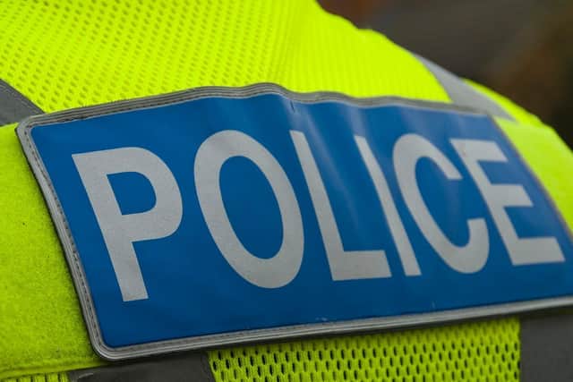 Two officers were assaulted while attempting to arrest a woman in St James on Saturday night