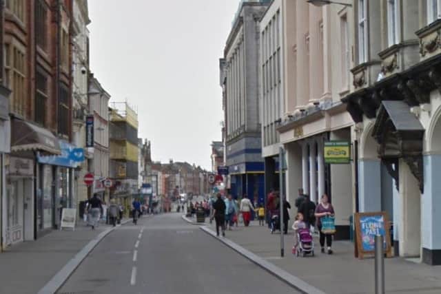 A dangerous driver mounted the kerb on Gold Street and drove at pedestrians to escape police.