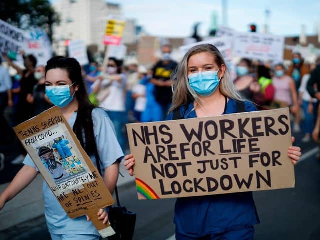 Health workers marched on Downing Street last July to make their case for a decent pay rise.