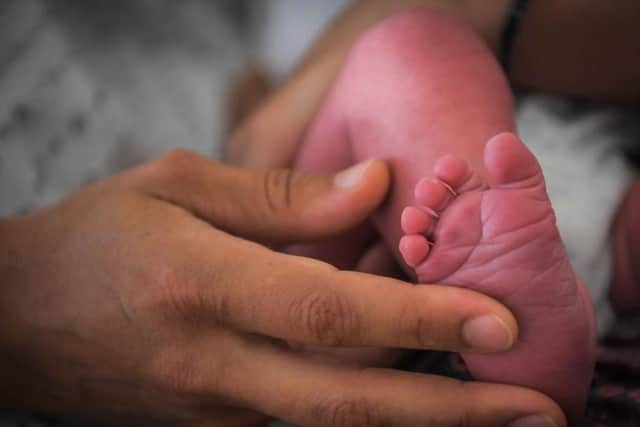 A coroner has warned against the dangers of co-sleeping following the death of a baby girl in Northampton. (File picture) Credit: LOIC VENANCE/AFP via Getty Images.