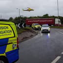 An Air Ambulance at the scene of this morning's crash but sadly a lorry driver later died.