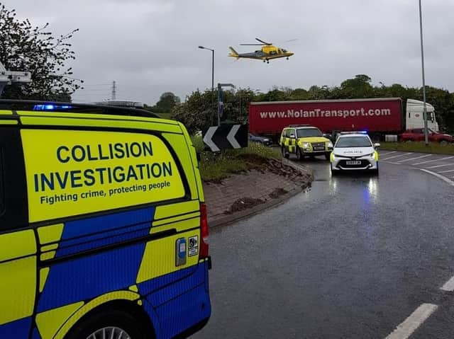 An Air Ambulance at the scene of this morning's crash but sadly a lorry driver later died.