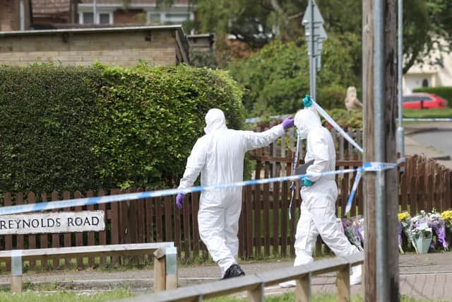 Forensics officers on the scene